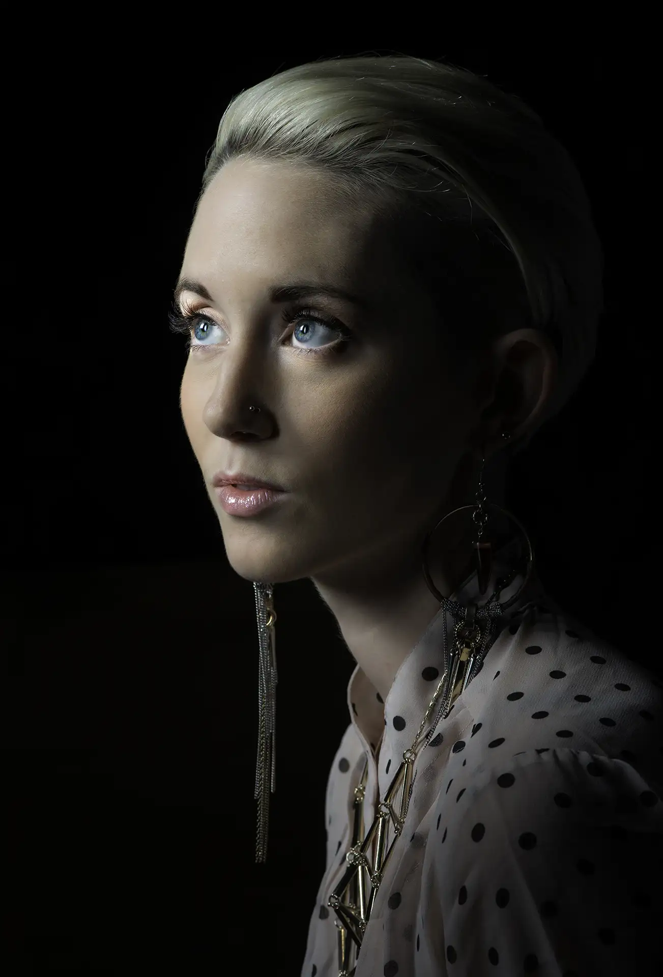 Moody studio portrait for eyelashes advertising.